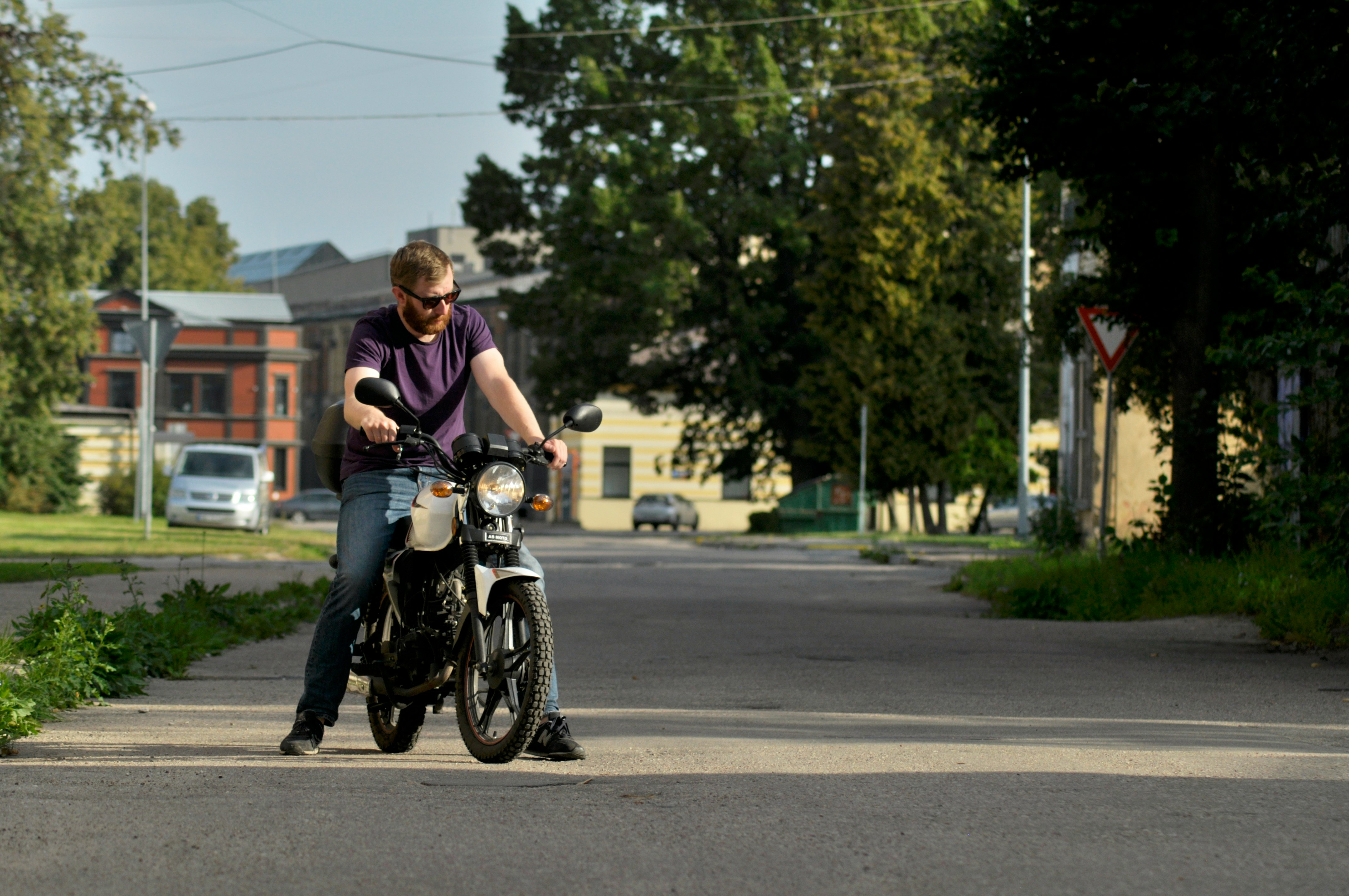 man riding on motorcycle